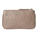 GUCCI GG Emblem Grain Key Pouch Taupe