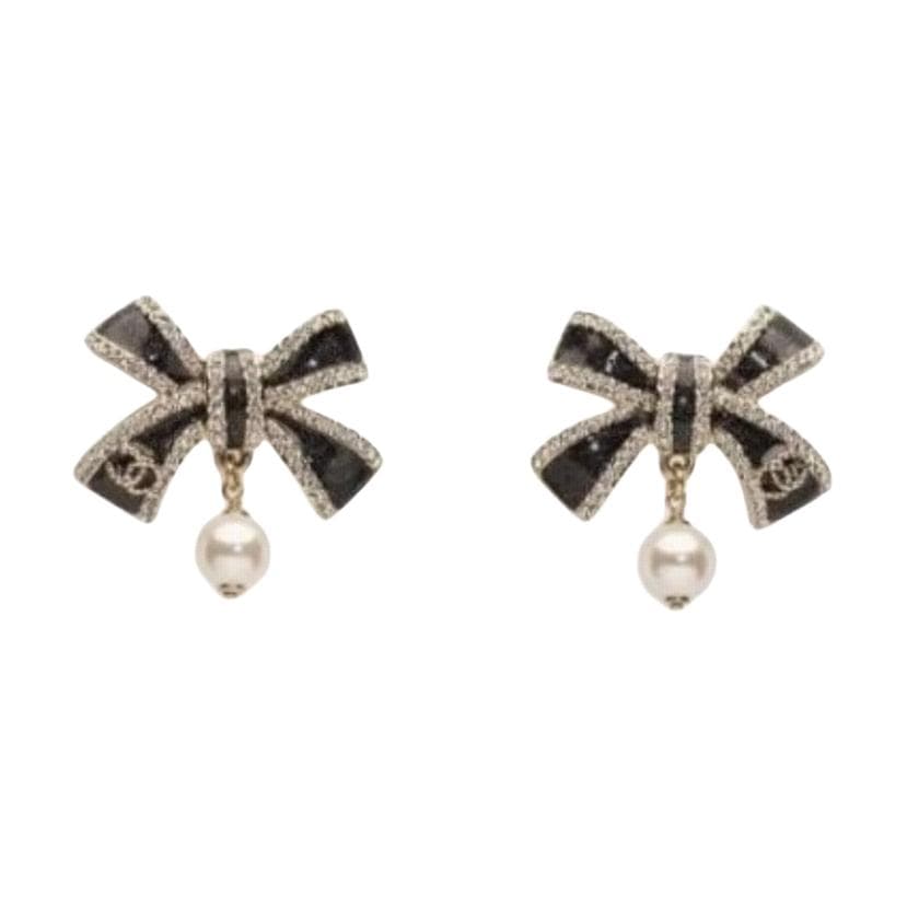 CHANEL Stud Earrings Black