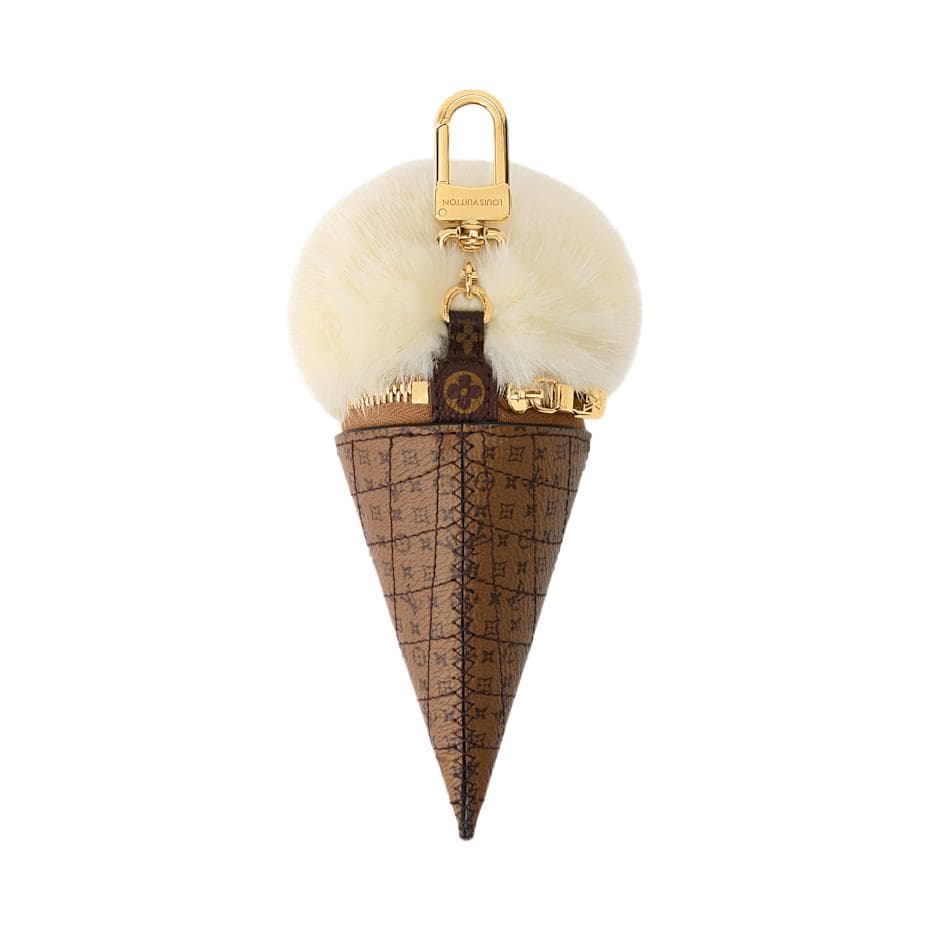 LOUIS VUITTON Fur With Monogram Reverse Coated Canvas Earphone Case Vanilla White