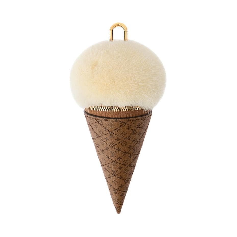 LOUIS VUITTON Fur With Monogram Reverse Coated Canvas Earphone Case Vanilla White Basic Set (Bag+Dust Bag)